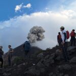 Hikes stop in awe to see View from Fuego Volcano in Guatemala