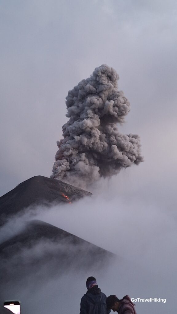 Volcan Fuego erupts thru the clouds - Guatemala